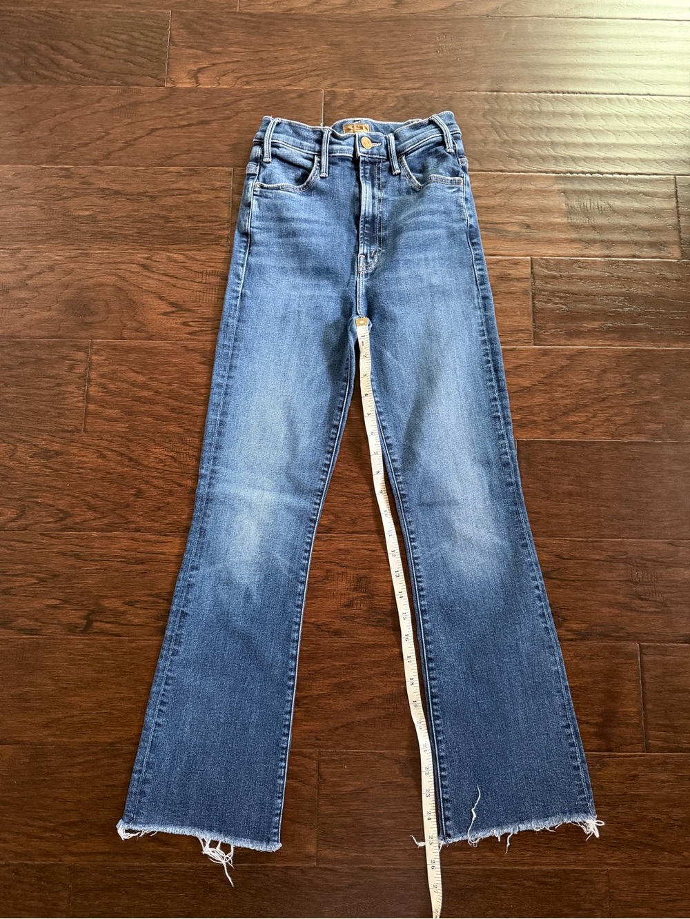 MOTHER Medium Blue High-Rise Flare Jeans with Raw Hem